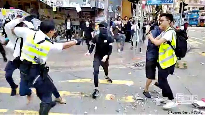 Video shows HK police shooting unarmed protester